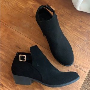 Black suede Top Moda booties with gold buckle